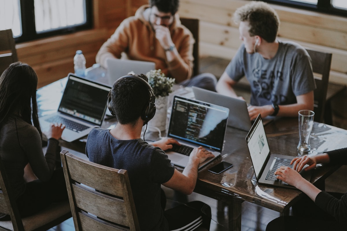 Diverse team collaborating around a table